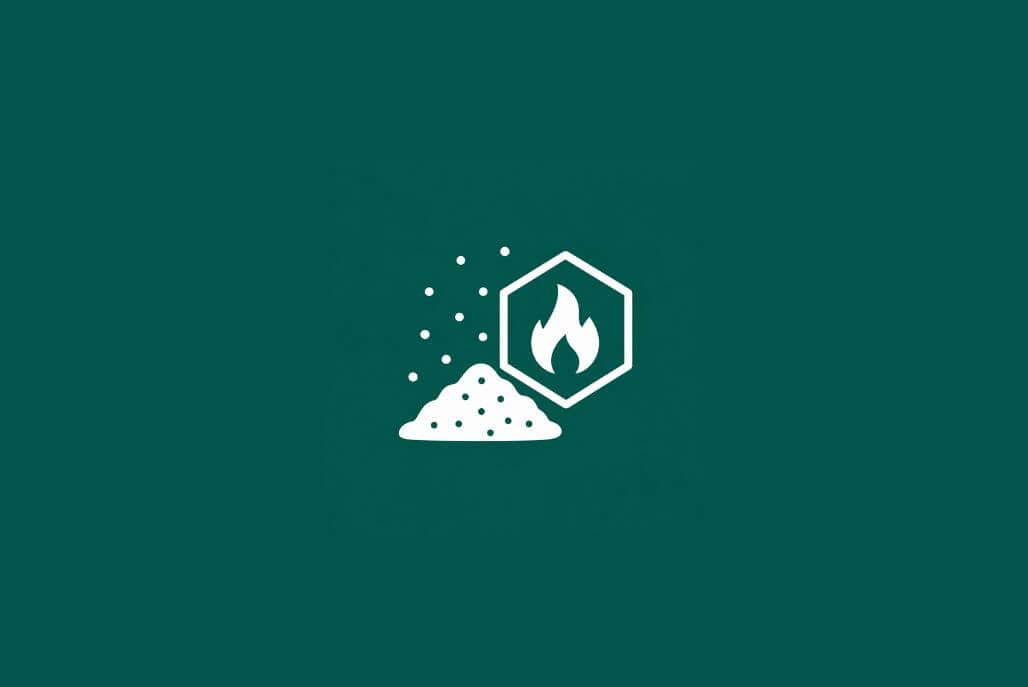 Simple icon representing combustible dust hazards in industrial environments with dust particles and flame symbol